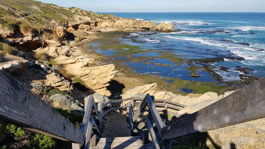 Coastal view with wooden staircase.
